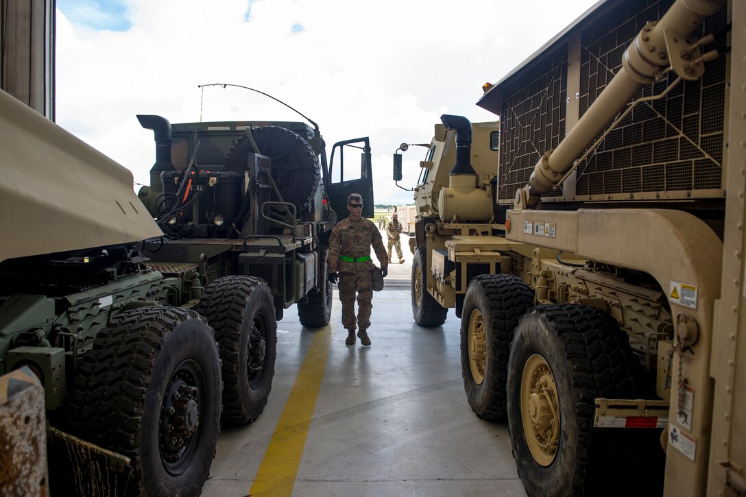 U.S. Army Sgt. Keeling from the 94th Army Air and Missile Defense Command, Task Force Talon, inspects vehicles during a Typhoon readiness exercise, 9 May, 2018, on Andersen Air Force Base, Guam. The exercise helped the soldiers practice the close coordination and different procedures they may have to implement to protect assets and personnel in the event of exceptionally severe weather. (U.S. Air Force photo/Senior Airman Zachary Bumpus)