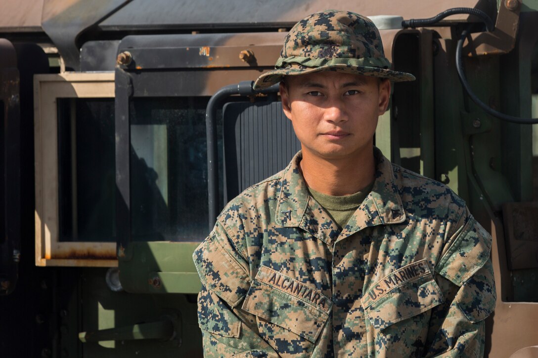 U.S. Marine Lance Cpl. Nicolle Lacantara works on his vehicle on Colonel Ernesto Ravina Air Base during Exercise Balikatan, in Tarlac, Philippines, May 11, 2018.