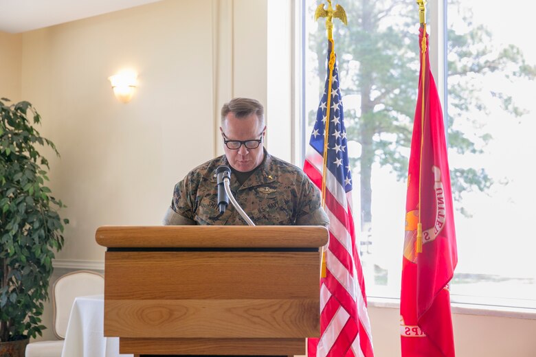 Patrick Smith, senior chaplain, Marine Corps Air Station New River, gives a summary of the history of the National Day of Prayer during the National Day of Prayer at the Officers' Club on MCAS New River, May 3.  The National Day of Prayer is open to all people of all faiths to pray for the nation. (U.S. Marine Corps photo by Lance Cpl. Nicholas Lubchenko)