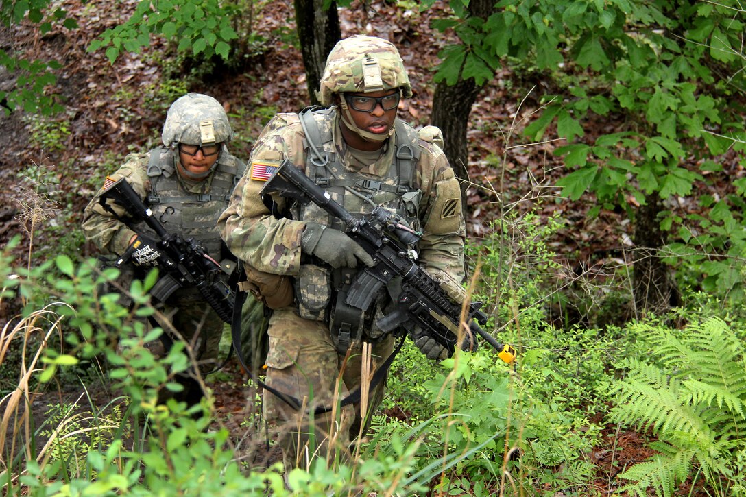 Soldiers patrol to their follow-on objective.