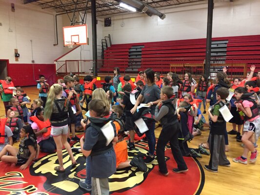 Ashland City Elementary School students wear their life jackets as part of the "2018 Summer Pledge to Practice Water Safety" in Ashland City, Tenn., May 10, 2018. The U.S. Army Corps of Engineers Nashville District park rangers at Cheatham Lake engages students on the importance of water safety to culminate the "2018 Summer Pledge to Practice Water Safety." (Photo by Chip Roney)