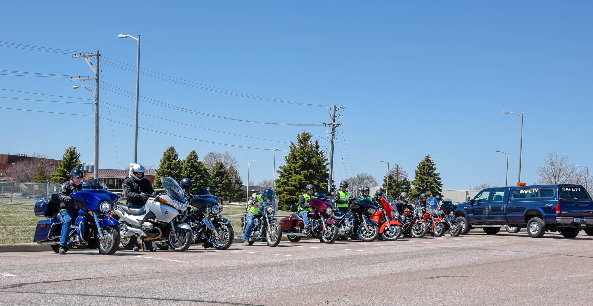 South Dakota Air National Guard motorcycle riders prepare to depart for the mentorship ride after participating in the annual motorcycle training at Joe Foss Field, S.D.