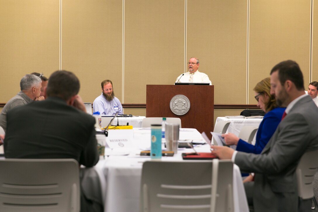 Garry Neal, Regional Emergency manager for MCI-East, discusses the importance of preparing for an emergency during the simulated worst-case scenario Category Four Hurricane Table Top Exercise at the Onslow County Government Complex, May 1. The Table Top Exercise was designed to provide the skills and knowledge to develop and improve the overall quality and workability of hurricane preparation and recovery plans. (U.S. Marine Corps photo by Lance Cpl. Nicholas Lubchenko)