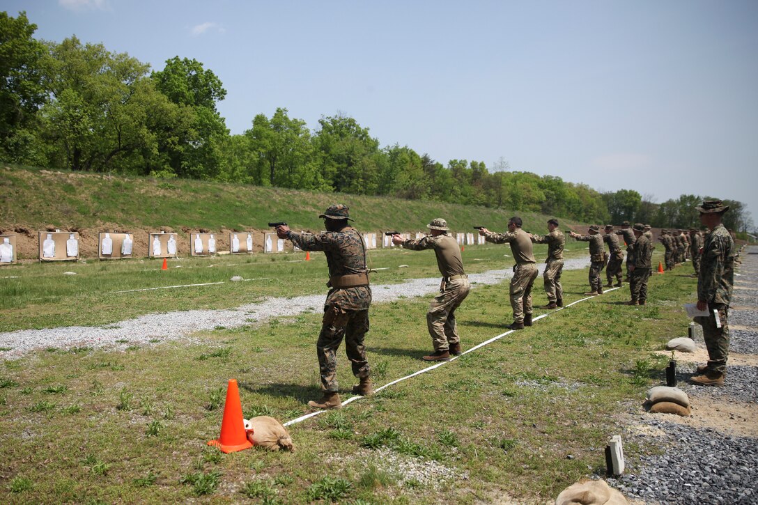 U.S. Marines with 6th Engineer Support Battalion, 4th Marine Logistics Group, and British commando’s with 131 Commando Squadron Royal Engineers, British Army, conduct a live fire pistol range during exercise Red Dagger at Fort Indiantown Gap, Pa., May 15, 2018.