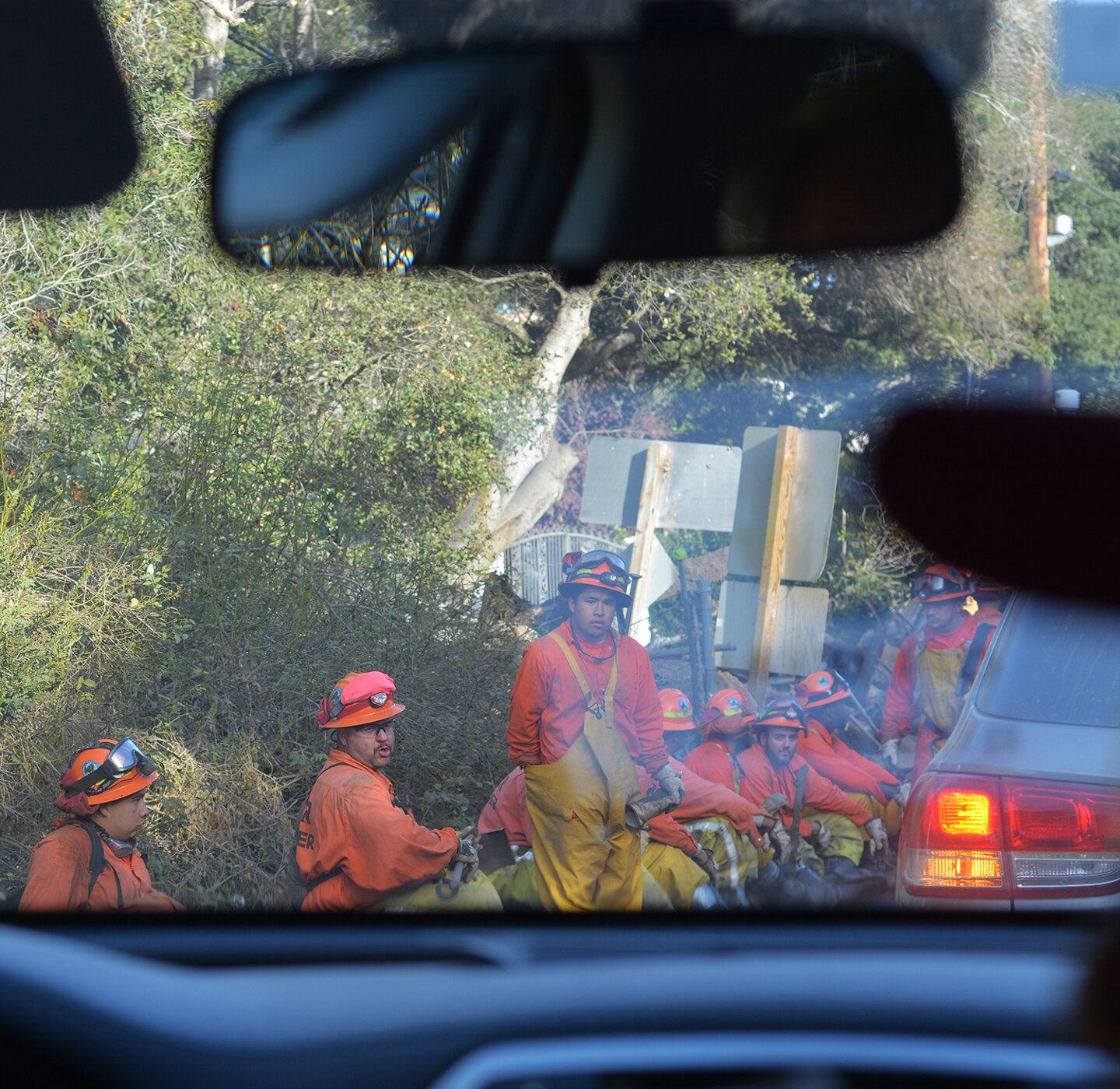 : Emergency responders take a break from recovery efforts Jan. 18 in Montecito, California.