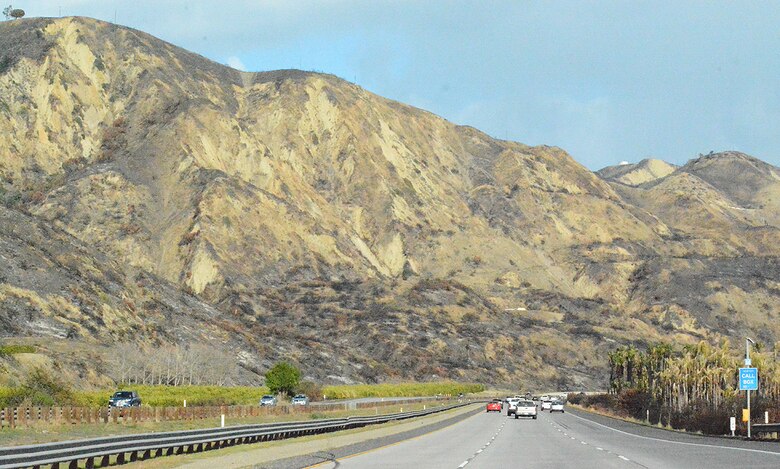 Burn scars along the mountainsides can be seen from the 101 Freeway Feb. 27 in Santa Barbara County, California. The burn scars are remnants of the Thomas Wildfire, one of the largest wildfires in California’s history, which burnt more than 425 square miles between Ventura and Santa Barbara counties.