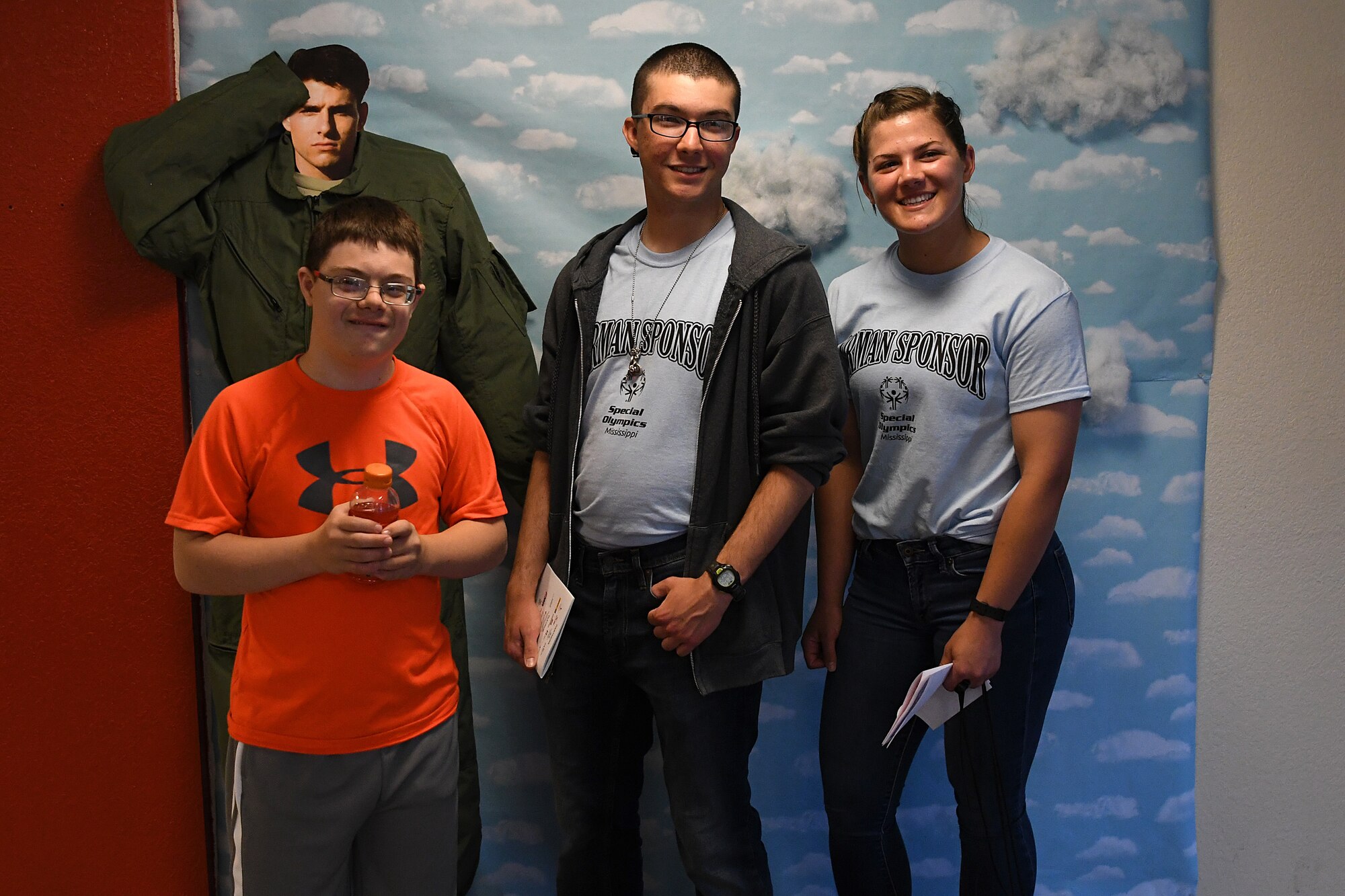 Easton Slutz, District 5 Special Olympics Mississippi athlete, U.S. Air Force Airmen Gabriel Agostini-Mesa and Kaimryn Hursch, 336th Training Squadron students, pose for a picture during SOMS in Smith Manor at Keesler Air Force Base, Mississippi, May 11, 2018. This was Slutz’s first year competing in SOMS and Agostini-Mesa and Hursch were assigned as his Airman Sponsors. (U.S. Air Force photo by Airman 1st Class Suzie Plotnikov)
