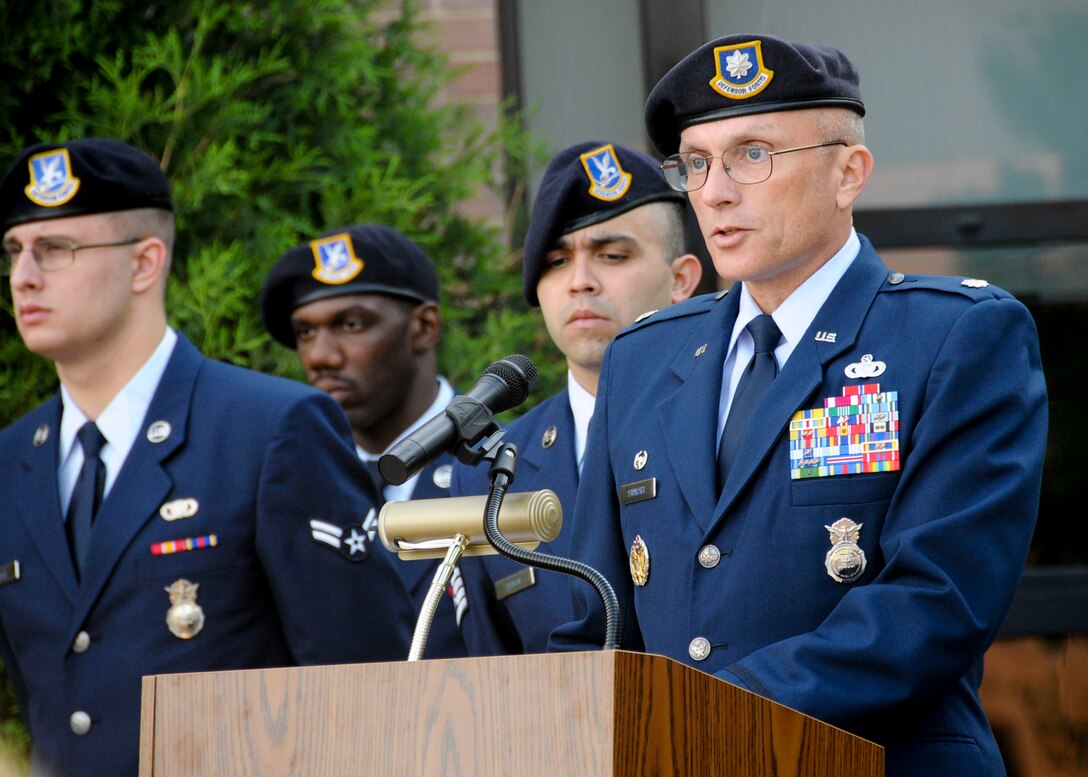 Lt. Col. Scott D. Stewart, commander of the 910th Security Forces Squadron, speaks at a ceremony in recognition of Peace Officers Memorial Day outside the 910th Airlift Wing Headquarters building on Youngstown Air Reserve Station, May 16, 2018.