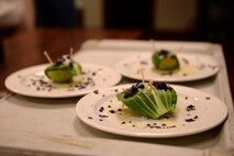 The finished product of Airman 1st Class Joel Hendrickson, 56th Logistics Readiness Squadron vehicle operator, and Senior Airman David Escobar’s, 56th Force Support Squadron food service apprentice, sits on a tray ready during the Taste of Luke cooking competition at Luke Air Force Base, Ariz., May 9, 2018. Hendrickson and Escobar took first place. (U.S. Air Force photo by Senior Airman Ridge Shan)