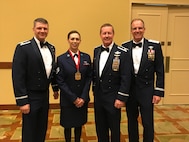 Staff Sgt. Kristin Feldner, 919th Special Operations Logistics Readiness Squadron, poses for a photo moments after receiving her award as one Air Force Special Operations Command’s Outstanding Airmen of the Year May 9, 2018 at Hurlburt Field, Florida