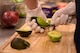 A competitor at the Taste of Luke cooking competition peels an avocado at Luke Air Force Base, Ariz., May 9, 2018. The cooking competition, like others that the 56th Force Support Squadron hosts throughout the year, required competitors to cook three different dishes, an appetizer, an entrée, and a dessert, to complete a three-course meal. (U.S. Air Force photo by Senior Airman Ridge Shan)