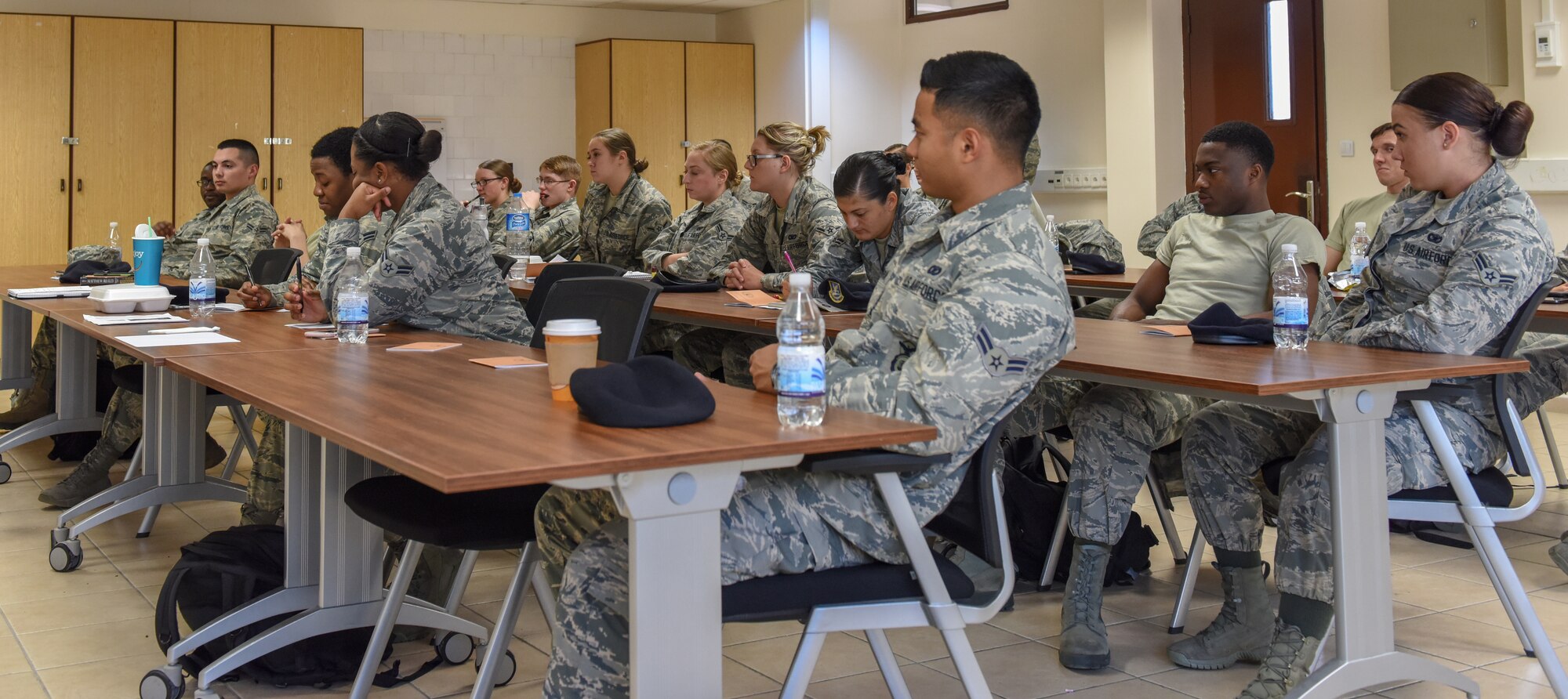 U.S. Air Force Airmen listening to mentor during FTAC.