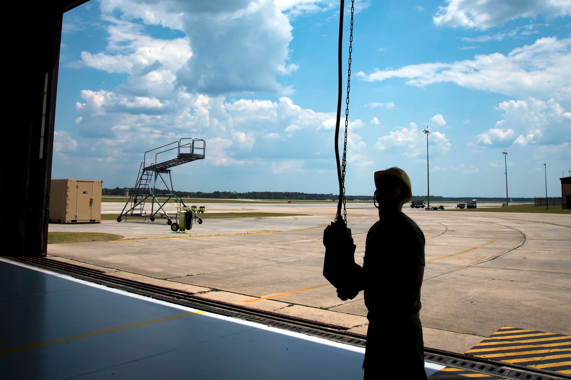 An Airman from the 723d Aircraft Maintenance Squadron (AMXS), operates a lift mechanism, May 10, 2018, at Moody Air Force Base, Ga. Airmen from the 723d AMXS along with machinists from the Corpus Christi Army Depot conducted a full-structural tear down and restoration on an HH-60G Pave Hawk. Once the aircraft was torn down, Airmen and the machinists performed repairs on all of its components prior to resembling it. (U.S. Air Force photo by Airman 1st Class Eugene Oliver)