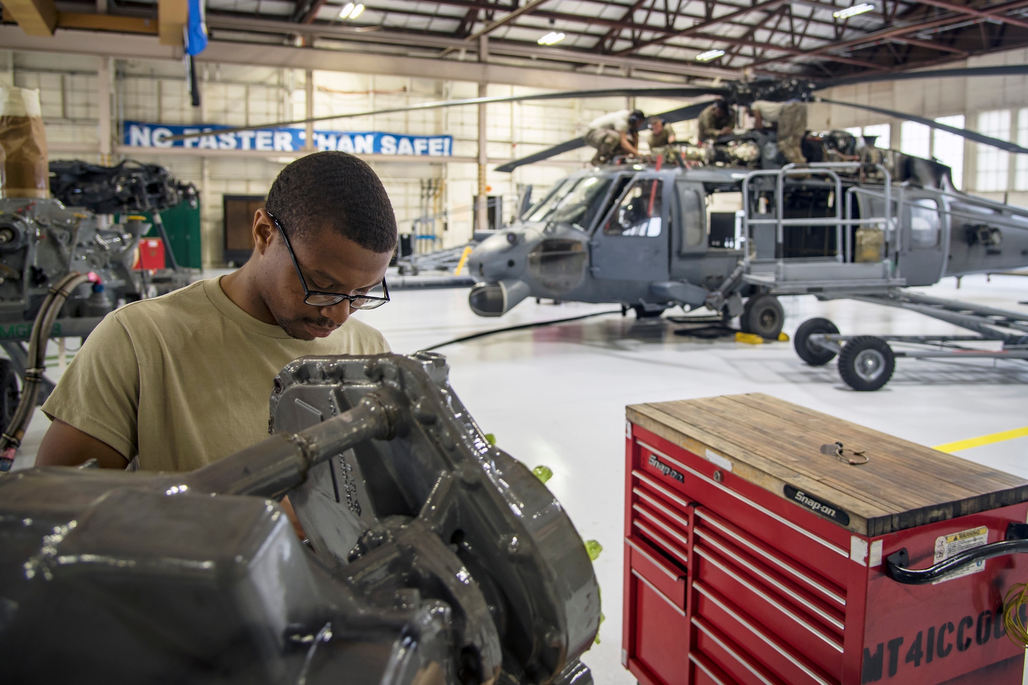 An Airman from the 723d Aircraft Maintenance Squadron (AMXS), inspects an accessory module, May 15, 2018, at Moody Air Force Base, Ga. Airmen from the 723d AMXS along with machinists from the Corpus Christi Army Depot conducted a full-structural tear down and restoration on an HH-60G Pave Hawk. Once the aircraft was torn down, Airmen and the machinists performed repairs on all of its components prior to resembling it. (U.S. Air Force photo by Airman 1st Class Eugene Oliver)