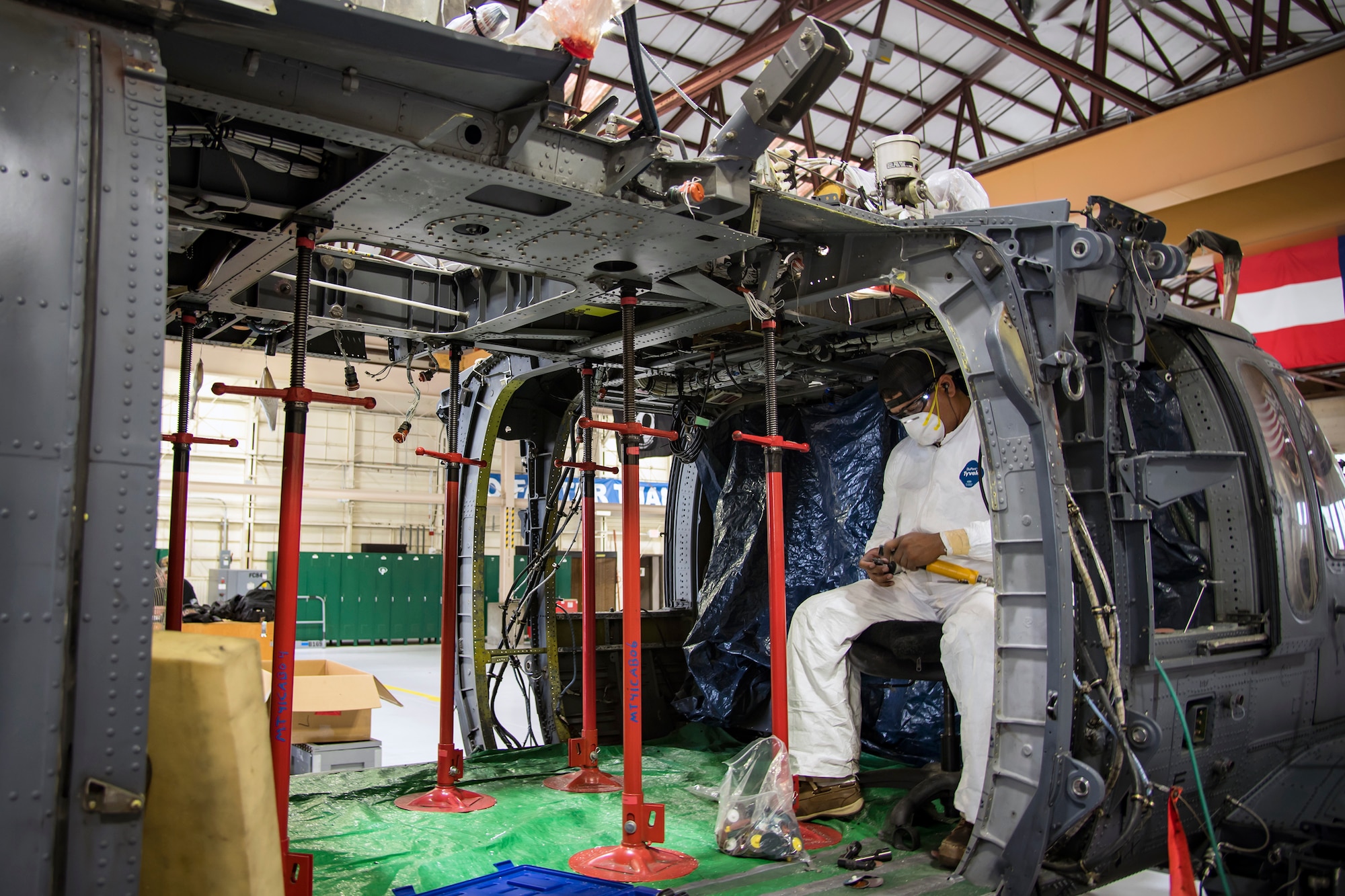 Erasmo Leal, a machinist from the Corpus Christi Army Depot (CCAD), inspects his tools, May 15, 2018, at Moody Air Force Base, Ga. Airmen from the 723d Aircraft Maintenance Squadron along with machinists from the CCAD conducted a full-structural tear down and restoration on an HH-60G Pave Hawk. Once the aircraft was torn down, Airmen and the machinists performed repairs on all of its components prior to resembling it. (U.S. Air Force photo by Airman 1st Class Eugene Oliver)