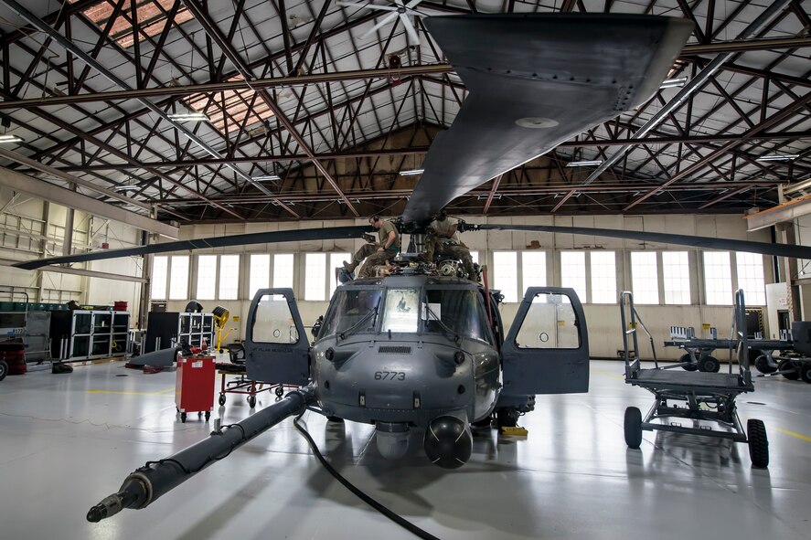 Airmen from the 723d Aircraft Maintenance Squadron (AMXS), repair rotors on an HH-60G Pave Hawk, May 15, 2018, at Moody Air Force Base, Ga. Airmen from the 723d AMXS along with machinists from the Corpus Christi Army Depot conducted a full-structural tear down and restoration on an HH-60G Pave Hawk. Once the aircraft was torn down, Airmen and the machinists performed repairs on all of its components prior to resembling it. (U.S. Air Force photo by Airman 1st Class Eugene Oliver)