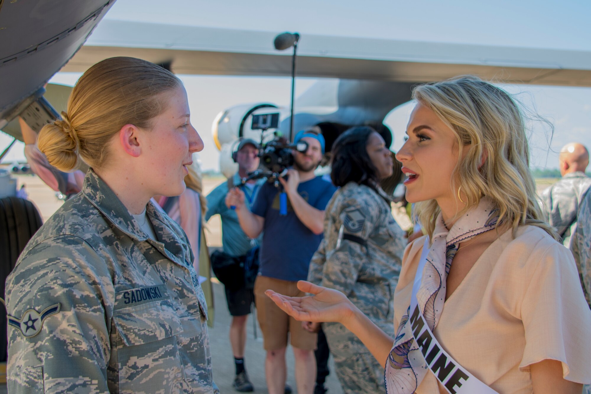 Marina Gray, Miss Maine USA 2018, talks to U.S. Air Force Airman Madison Sadowski, an aircraft maintenance specialist assigned to the 2nd Aircraft Maintenance Squadron, at Barksdale Air Force Base, Louisiana, May 15, 2018.