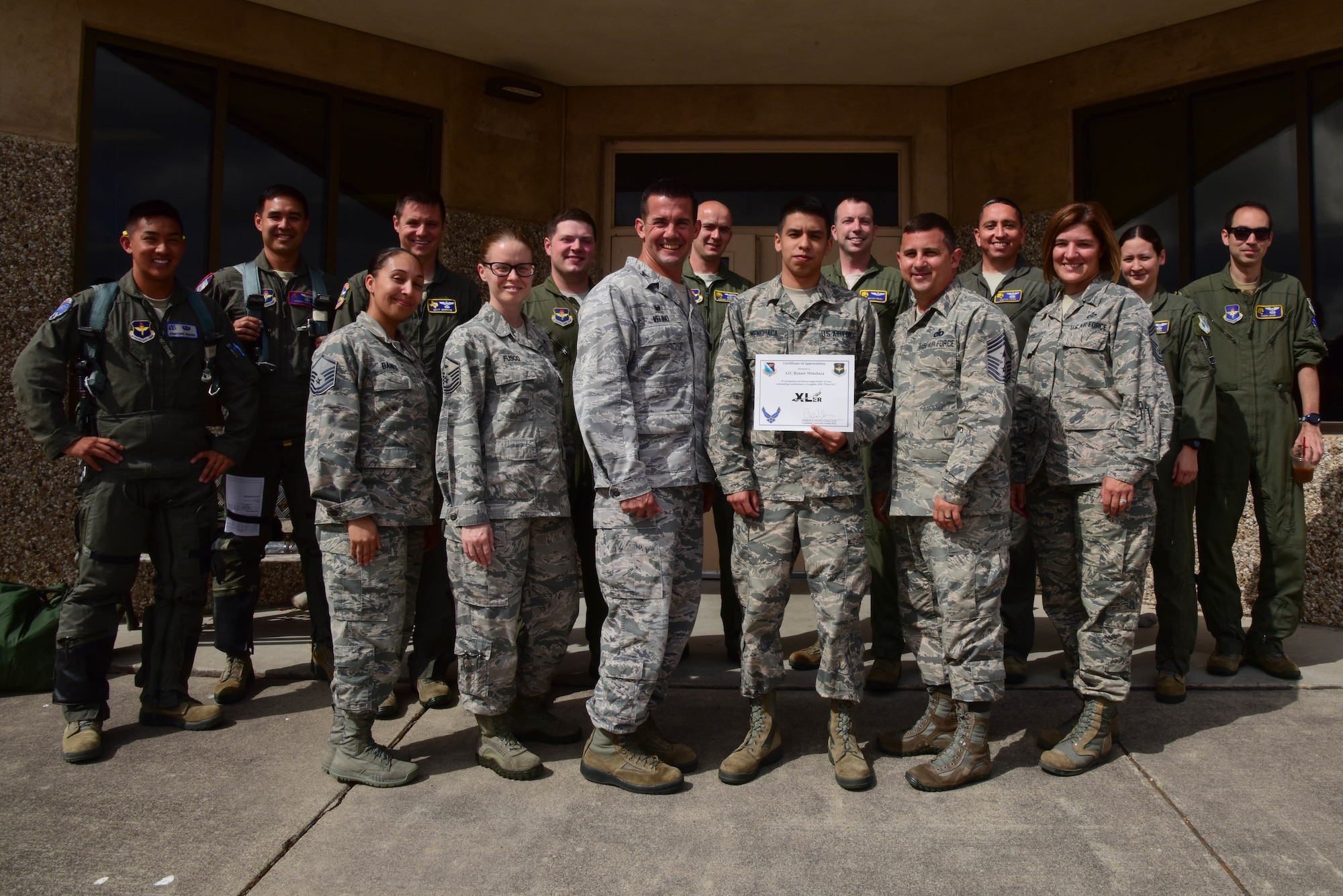 Airman 1st Class Renato Menchaca, 85th Flying Training Squadron aviation resource manager, was chosen by wing leadership to be the “XLer” of the week, for the week of May 14, 2018, at Laughlin Air Force Base, Texas. The “XLer” award, presented by Col. Charlie Velino, 47th Flying Training Wing commander, is given to those who consistently make outstanding contributions to their unit and the Laughlin mission. (U.S. Air Force photo by Airman 1st Class Marco A. Gomez)