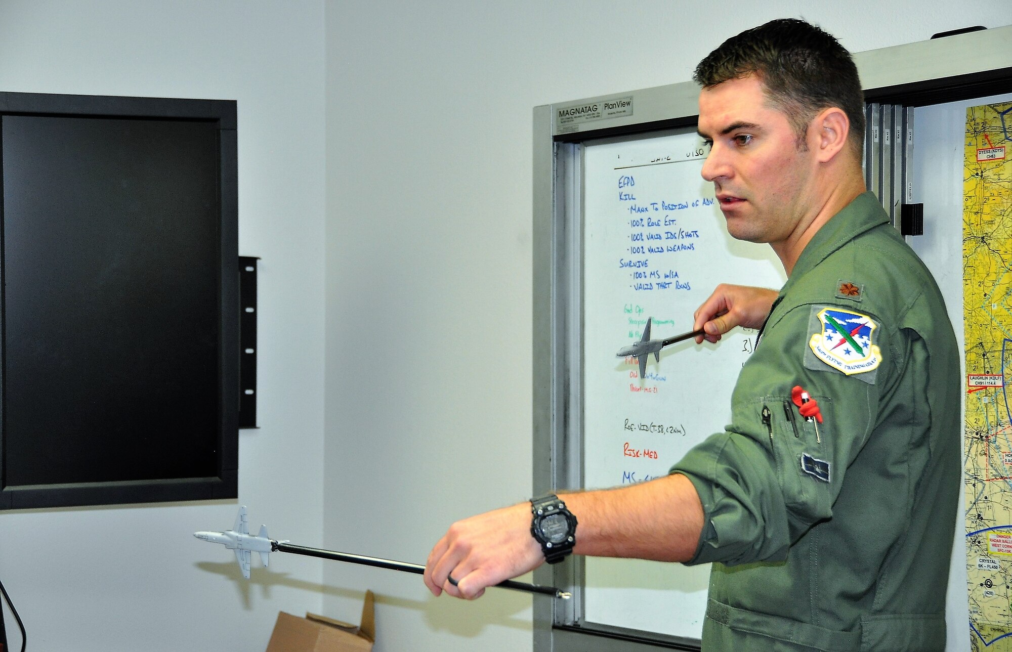 Maj. Jeff Nelson instructs an intercept maneuver in the new 5th generation syllabus. (U.S. Air Force photo by Janis El Shabazz)