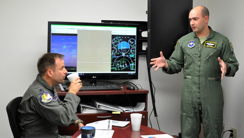 Maj Matt Bar teaching the new innovation 5th Generation Introduction to Fighter Fundamentals syllabus to Lt. Col. Kyle Goldstein. (U.S. Air Force photo by Janis El Shabazz)