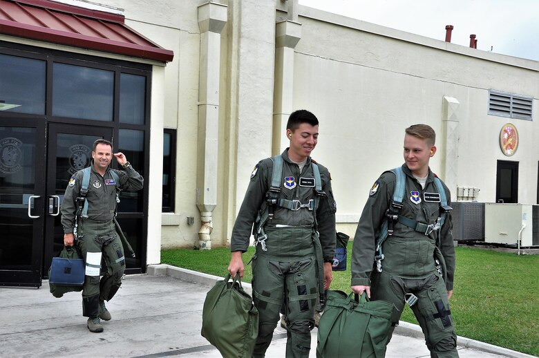 39th FTS Cobra Lieutenants Derek Hall and Jacob Summerhays heading to the flight line for an incentive ride in the T-38. (U.S. Air Force photo by Janis El Shabazz)