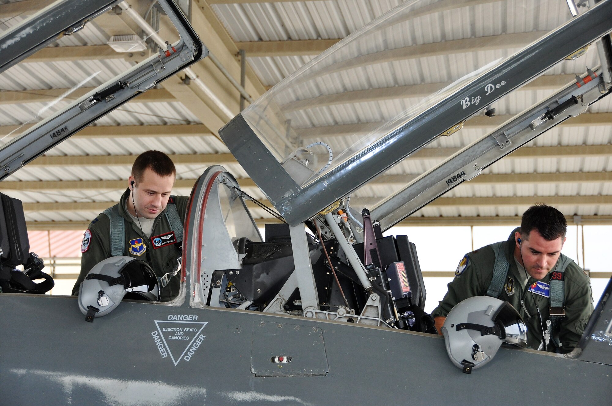 Capt. Joshua Smith and Maj. Jeff Nelson ready the T-38 for flight during the 2018 Cobras in the Clouds exercise. (U.S. Air Force photo by Janis El Shabazz)