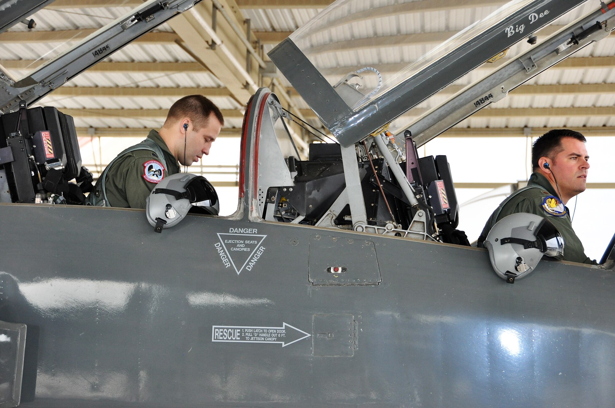 Capt. Joshua Smith and Maj. Jeff Nelson ready the T-38 for flight during the 2018 Cobras in the Clouds exercise. (U.S. Air Force photo by Janis El Shabazz)