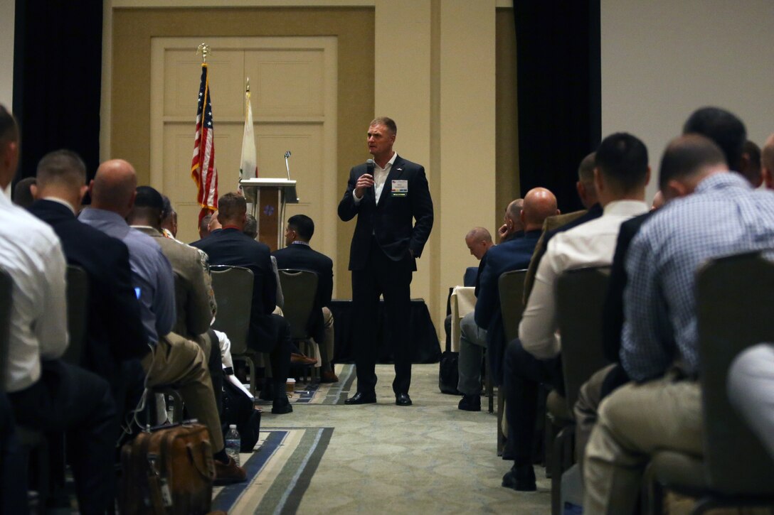 Lt. Gen. Steven Rudder, deputy commandant for aviation, Headquarters Marine Corps, addresses attendees of the 47th Annual Marine Corps Aviation Association Symposium and Marine Aviation Summit in San Diego, May 15. Hundreds of Naval aviators attended the opening brief of the aviation symposium, a weeklong event in which senior leaders gather to discuss the future of Marine Corps aviation and how to achieve its set goals. (U.S. Marine Corps photo by Lance Cpl. Mark A. Lowe II/Released)