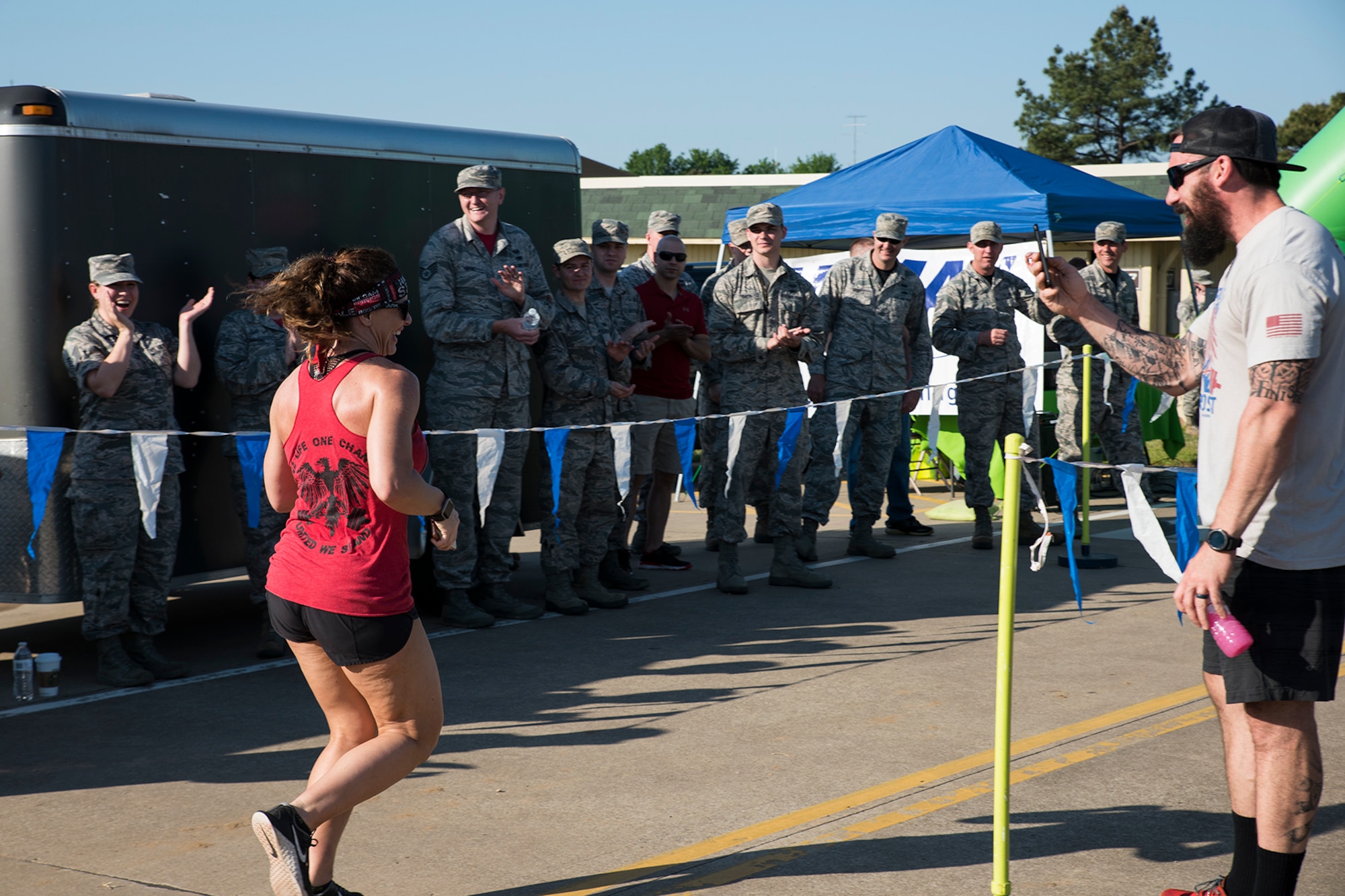 Airmen, family members, and community supporters participate in the 6th Annual Hawg Jawg 5K run held at Ebbing Air National Guard Base in Ft. Smith, Ark., May 6, 2018. The event was part of the 188th Wing’s annual family day, an event designed to build morale and camaraderie for wing members and families. (U.S. Air National Guard photo by Tech. Sgt. John E. Hillier)