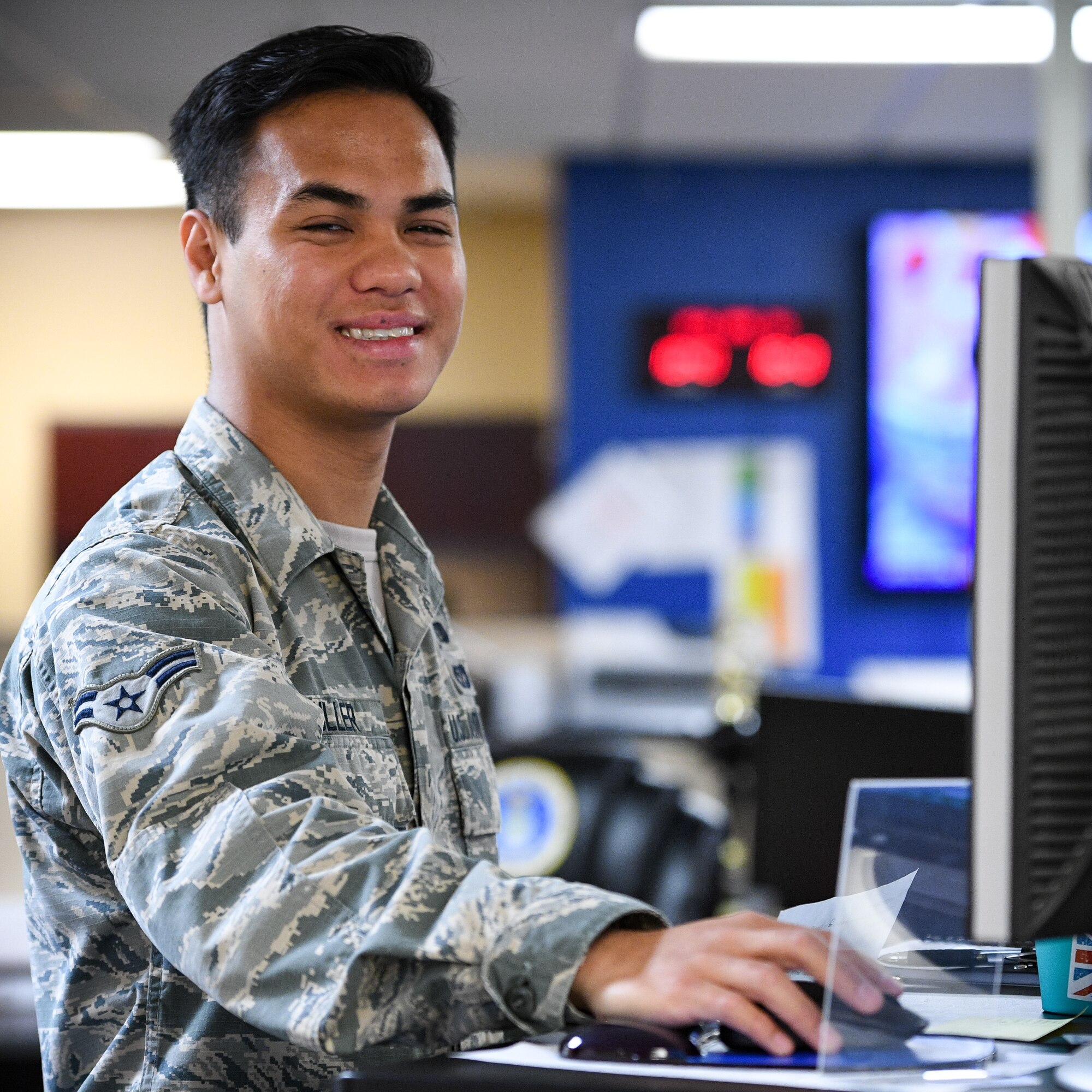 Airman 1st Class Vincent Duller poses for a photo April 30, 2018, at his work station at Hill Air Force Base, Utah. He was voted a Top 3 Superior Performer. (U.S. Air Force photo by R. Nial Bradshaw)