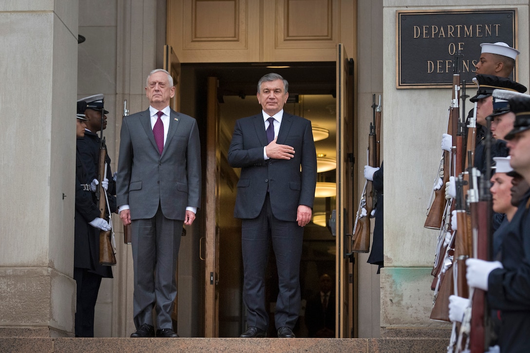 Defense Secretary James N. Mattis stands on the Pentagon steps with Uzbekistani President Shavkat Mirziyoyev.
