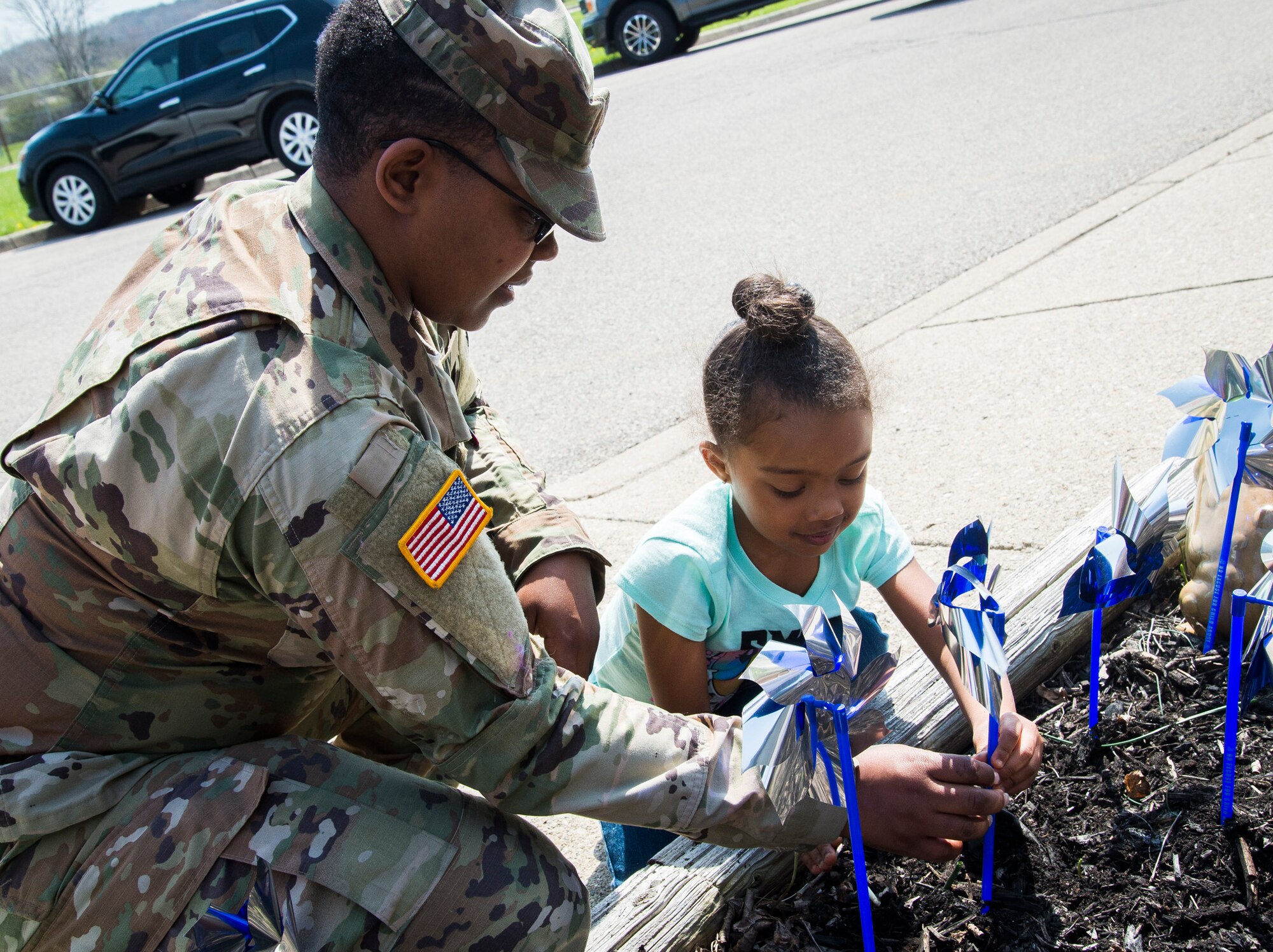 Pinwheel Gardens and Blue Ribbon Trees raise awareness for child abuse