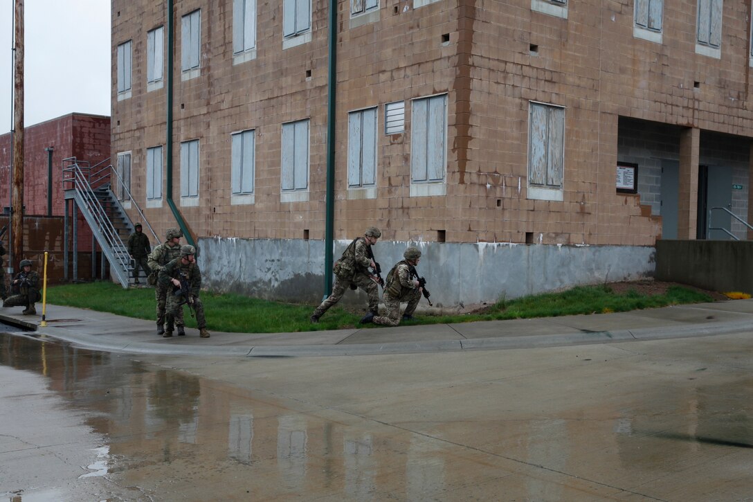 U.S. Marines with 6th Engineer Support Battalion, 4th Marine Logistics Group, and British commando’s with 131 Commando Squadron Royal Engineers, British Army, practice clearing a village at the military operations on urbanized terrain, or MOUT structure, during exercise Red Dagger at Fort Indiantown Gap, Pa., May 16, 2018.