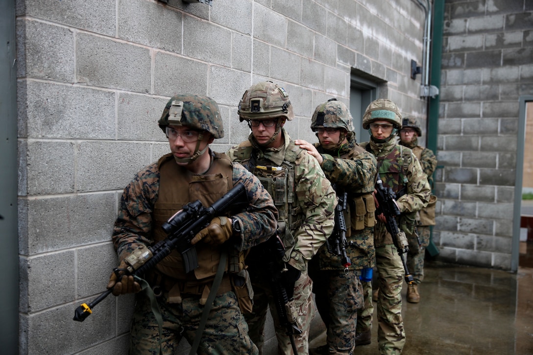 U.S. Marines with 6th Engineer Support Battalion, 4th Marine Logistics Group, and British commando’s with 131 Commando Squadron Royal Engineers, British Army, practice clearing a building at the military operations on urbanized terrain, or MOUT structure, during exercise Red Dagger at Fort Indiantown Gap, Pa., May 16, 2018
