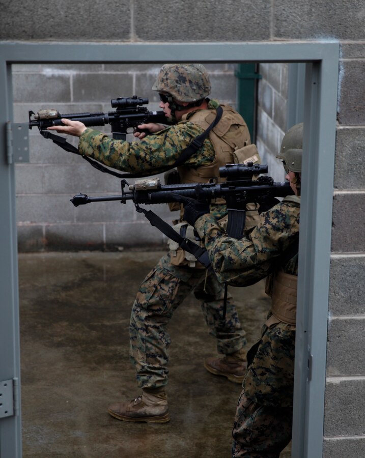 U.S. Marine Lance Cpl. Mitchell R. Neimann (left), heavy equipment operator with Bridge Company C., 6th Engineer Support Battalion, 4th Marine Logistics Group, and his fire team of Marines with 6th ESB, 4th MLG, and British commando’s with 131 Commando Squadron Royal Engineers, British Army, practice clearing a building at the military operations on urbanized terrain, or MOUT structure, during exercise Red Dagger at Fort Indiantown Gap, Pa., May 16, 2018. Exercise Red Dagger is a bilateral training exercise that gives Marines an opportunity to exchange tactics, techniques and procedures as well as build working relationships with their British counterparts. (U.S. Marine Corps photo by Sgt. Melanie Wolf/Released)