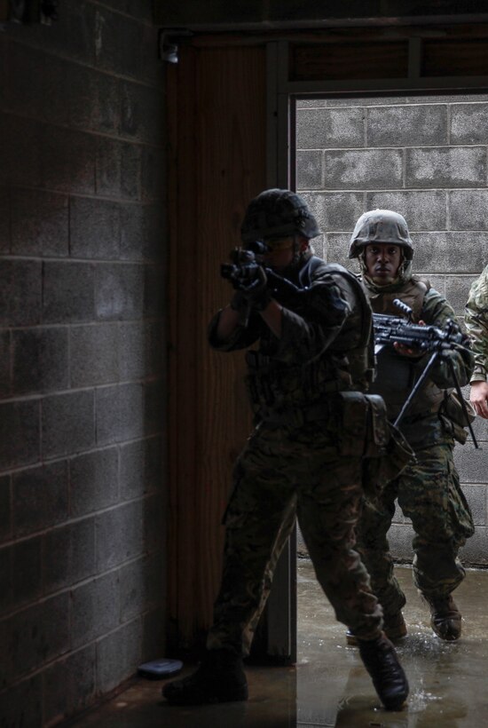 U.S. Marines with 6th Engineer Support Battalion, 4th Marine Logistics Group, and British commando’s with 131 Commando Squadron Royal Engineers, British Army, practice clearing a building at the military operations on urbanized terrain, or MOUT structure, during exercise Red Dagger at Fort Indiantown Gap, Pa., May 16, 2018.