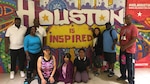 Members of the Defense Contract Management Agency International Region conduct the 2018 Walk to Wellness 5K in The Galleria mall Houston, Texas on May 2. This was the first walk the group conducted in an indoor setting, which allowed all employees to safely participate. (DCMA photo by Johanna Akinfenwa)