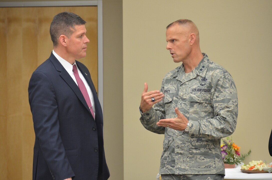 Air Force Installation and Mission Support Center Commander Maj. Gen. Brad Spacy talks to Assistant Secretary of the Air Force for Installations, Environment and Energy John Henderson during the AFIMSC general officer and senior executive service summit May 15 in San Antonio.  In addition to the summit, about 30 senior Air Force leaders also attended the Installation and Mission Support Weapons and Tactics Conference to listen to proposed solutions to some of the services greatest agile combat support challenges. (U.S. Air Force photo by Armando Perez)