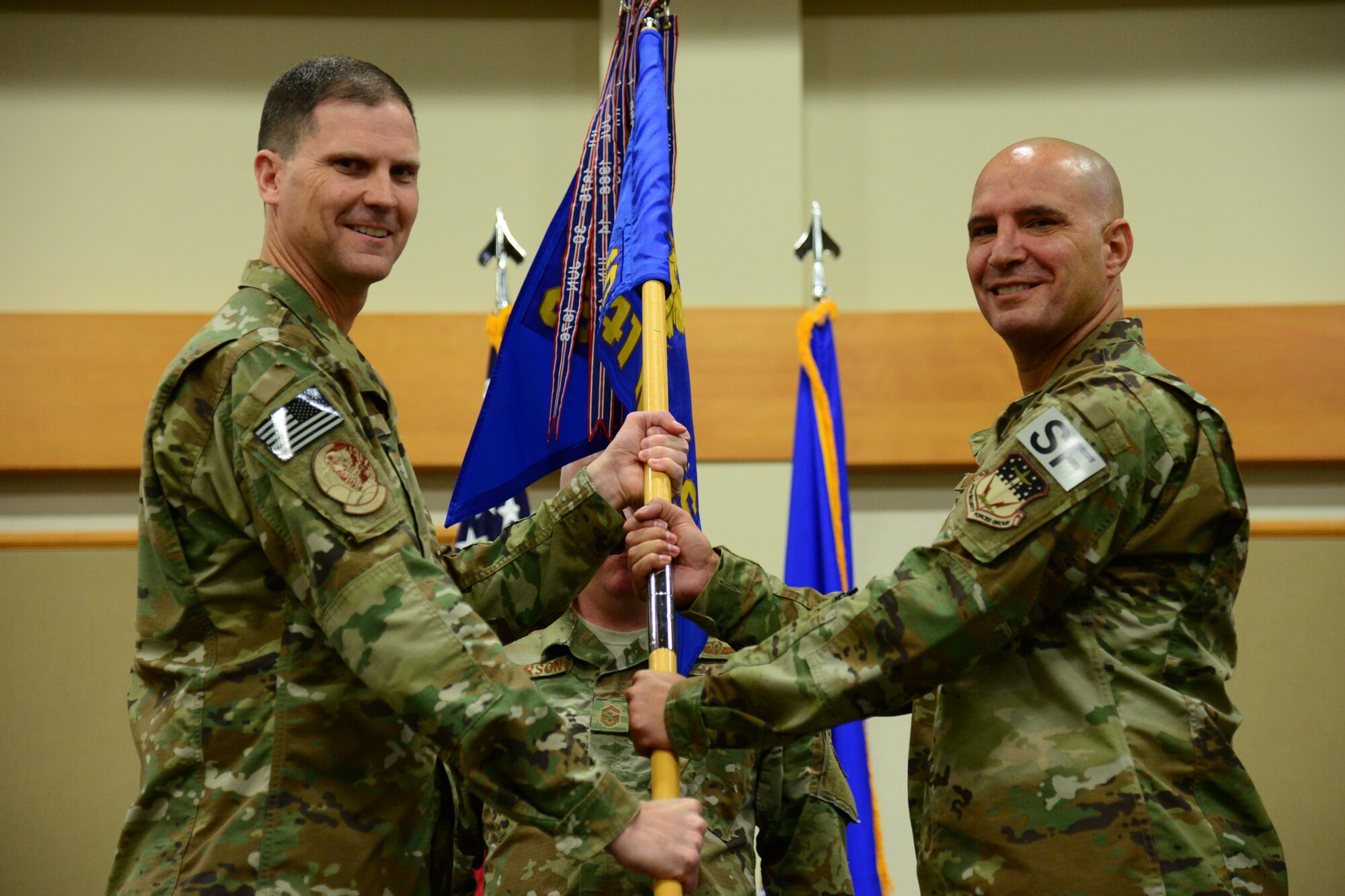 Lt. Col. Kevin Lombardo, right, accepts command of the 341st Missile Security Forces Squadron from Col. Aaron Guill, 341st Security Forces Group commander May 17, 2018, at Malmstrom Air Force Base, Mont.