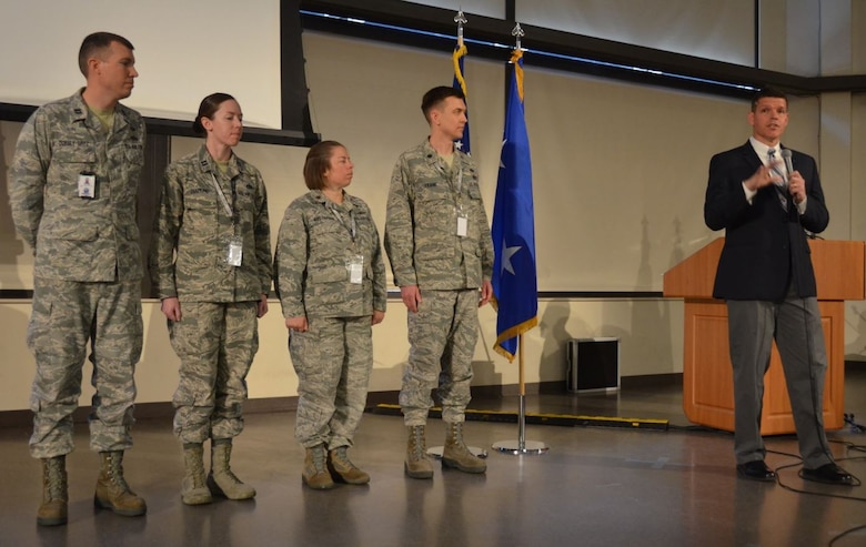 Assistant Secretary of the Air Force for Installations, Environment and Energy John Henderson lauds the hard work of mission area working group chairmen and their members at the 2018 Installation and Mission Support Weapons and Tactics Conference in San Antonio May 16. The four MAWGs were tasked with finding innovative solutions for pressing issues in the area of agile combat support and presented those solutions during the event out-brief attended by Henderson and about 1,000 other senior Air Force leaders and members of the installation and mission support community. (U.S. Air Force photo by Armando Perez)