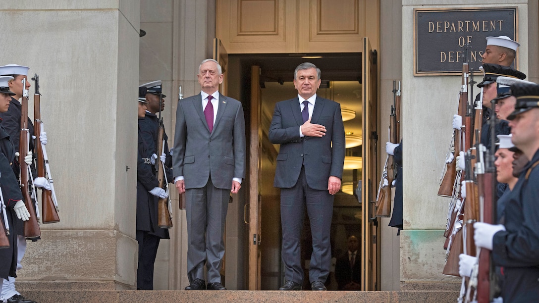 Defense Secretary James N. Mattis stands on the Pentagon steps with Uzbekistani President Shavkat Mirziyoyev.