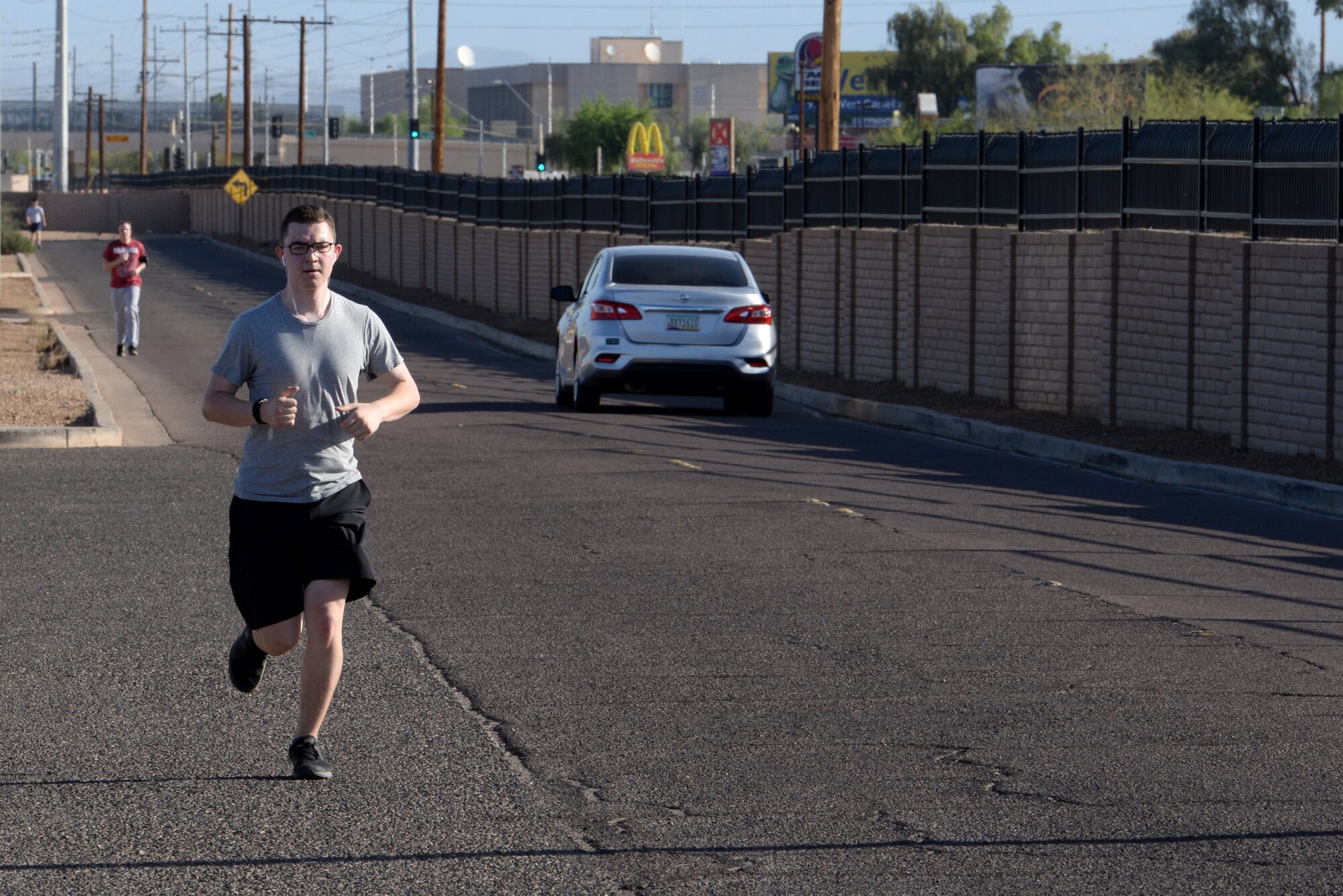 Participants in the Air Force Assistance Fund 5-kilometer Fun Run approach the finish line May 11, 2018, at Luke Air Force Base, Ariz. In 2017, Airmen and their families assigned to Air Education and Training Command received more than 200 thousand dollars in AFAF assistance.  (U.S. Air Force photo by Senior Airman Ridge Shan)