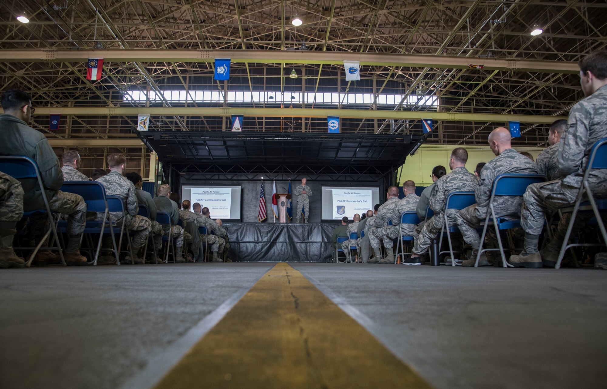 Service members listen as U.S. Air Force Gen. Terrence J. O’Shaughnessy, Pacific Air Forces commander, shares insight into his command’s vision, mission and goals for the future at Misawa Air Base, Japan, May 11, 2018. O’Shaughnessy thanked them for their efforts, which are vital role to regional security and stability. (U.S. Air Force photo by Senior Airman Sadie Colbert)