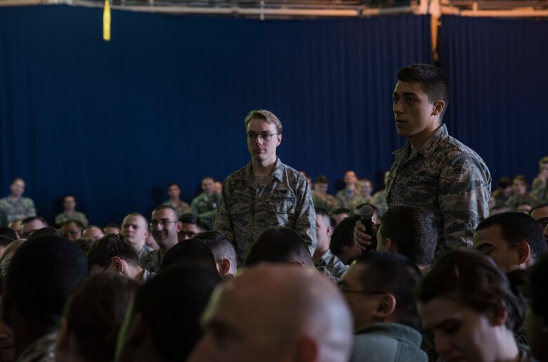 A U.S. Air Force Airman with the 35th Fighter Wing asks Gen. Terrence J. O’Shaughnessy, Pacific Air Forces (PACAF) commander, a question during the general’s commander’s call at Misawa Air Base, Japan, May 11, 2018. This one-on-one dialogue offered Airmen an opportunity to get answers to questions about the command from PACAF’s top leader. (U.S. Air Force photo by Senior Airman Sadie Colbert)