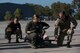 U.S. Air Force Staff Sgt. Rachel Wilson (center), 86th Aeromedical Evacuation Squadron aeromedical evacuation technician, instructs Hellenic service members on the procedure of lifting a patient during an exercise Stolen Cerberus V training mission at Elefsis Air Base, Greece, May 9, 2018. Exercises such as these improve joint aeromedical evacuation operations and procedures. (U.S. Air Force photo by Senior Airman Devin M. Rumbaugh)