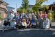 Volunteers from Yokota Air Base, Japan and the city of Fussa, Japan pose for a photo following the closing ceremony on day one of the Fussa Beautification Project in Fussa, May 14, 2018.