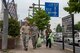 Volunteers from Yokota Air Base, Japan and the city of Fussa carry bags of weeds to be disposed of immediately following the Fussa Beautification Project in Fussa, May 17, 2018.