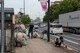 Volunteers from Yokota Air Base, Japan and the city of Fussa complete the finishing touches of cleaning up after the Fussa Beautification Project in Fussa, May 17, 2018.