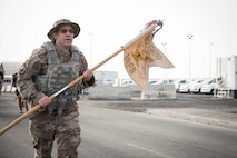 Members from Al Dhafra Air Base participate in a 5k run and ruck march in honor of National Police Week on Al Dhafra Air Base, United Arab Emirates, May 18, 2018. Participants carried bricks with names of fallen security forces officers.