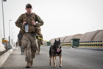 Members from Al Dhafra Air Base participate in a 5k run and ruck march in honor of National Police Week on Al Dhafra Air Base, United Arab Emirates, May 18, 2018. Participants carried bricks with names of fallen security forces officers.